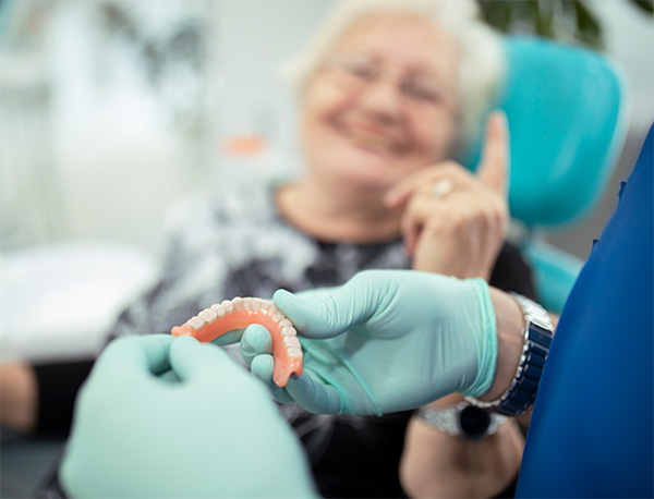 What to expect when you get a full set of dentures in Tampa Fl. image.